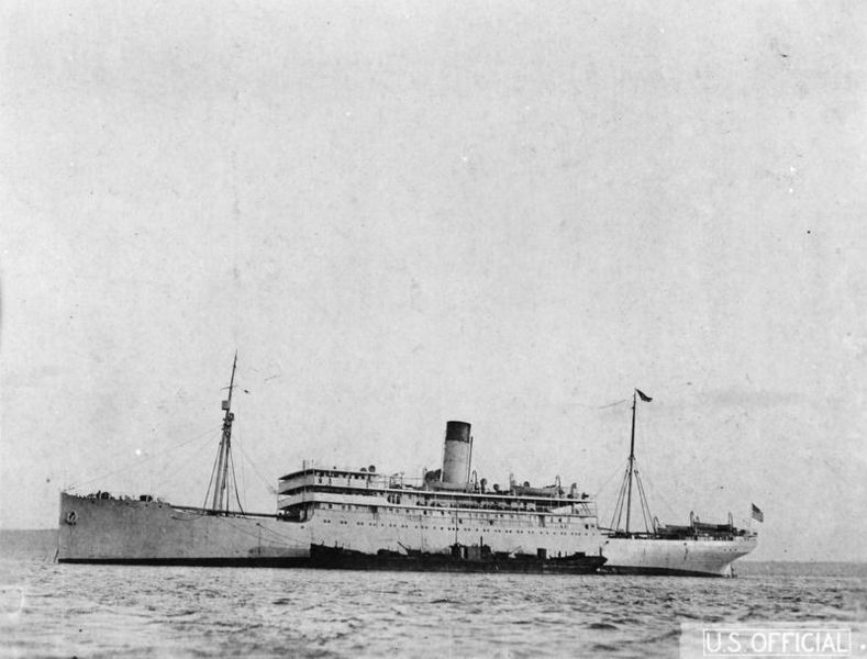 black and white image of a large ship in the water