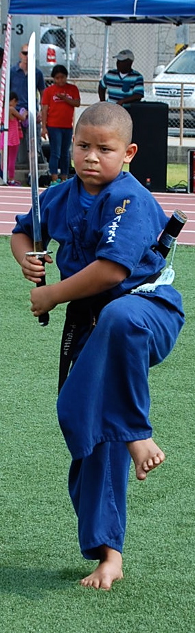 a child playing martial at a school