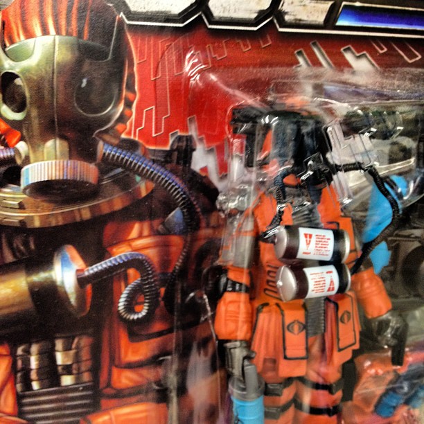 an action figure is being displayed on a store shelf