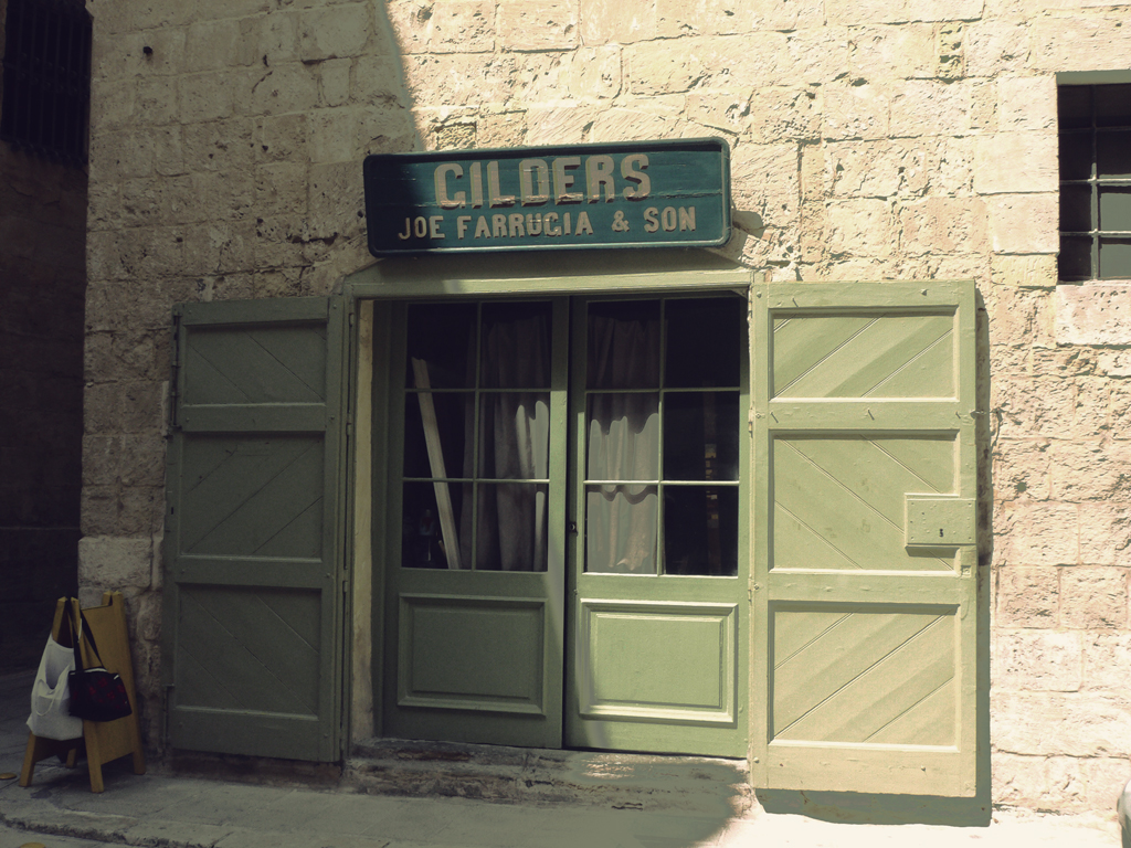 the doors to a store called clichers just faricala & son