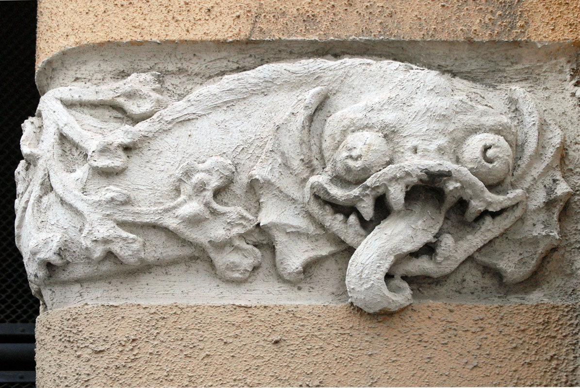 decorative sculpture featuring an elephant on a building