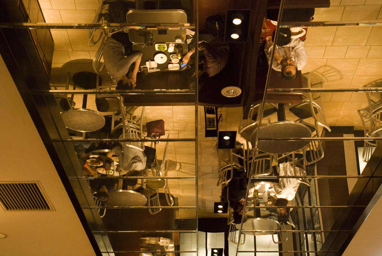 view from above of an industrial kitchen with many chairs