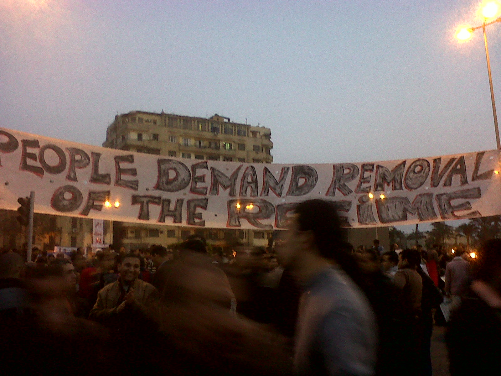 an image of a protest with people on the street