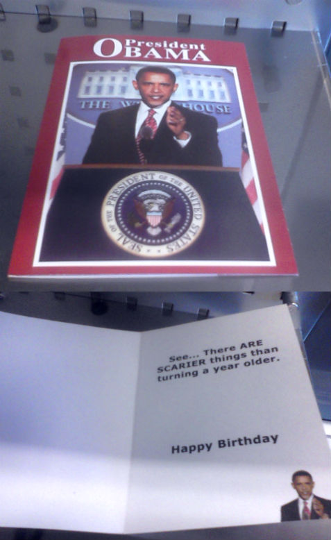 a obama birthday card in a display case