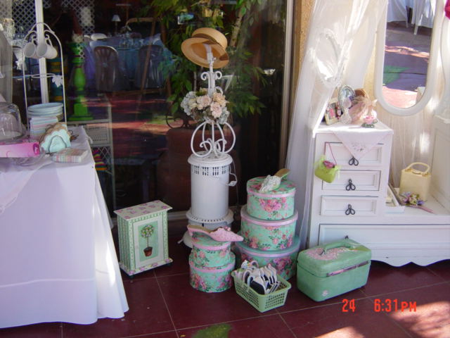 various wedding decorations in front of window and decorated with flowers