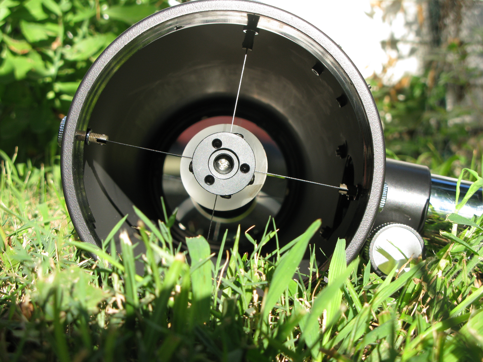 an outdoor blow dryer sits in the grass