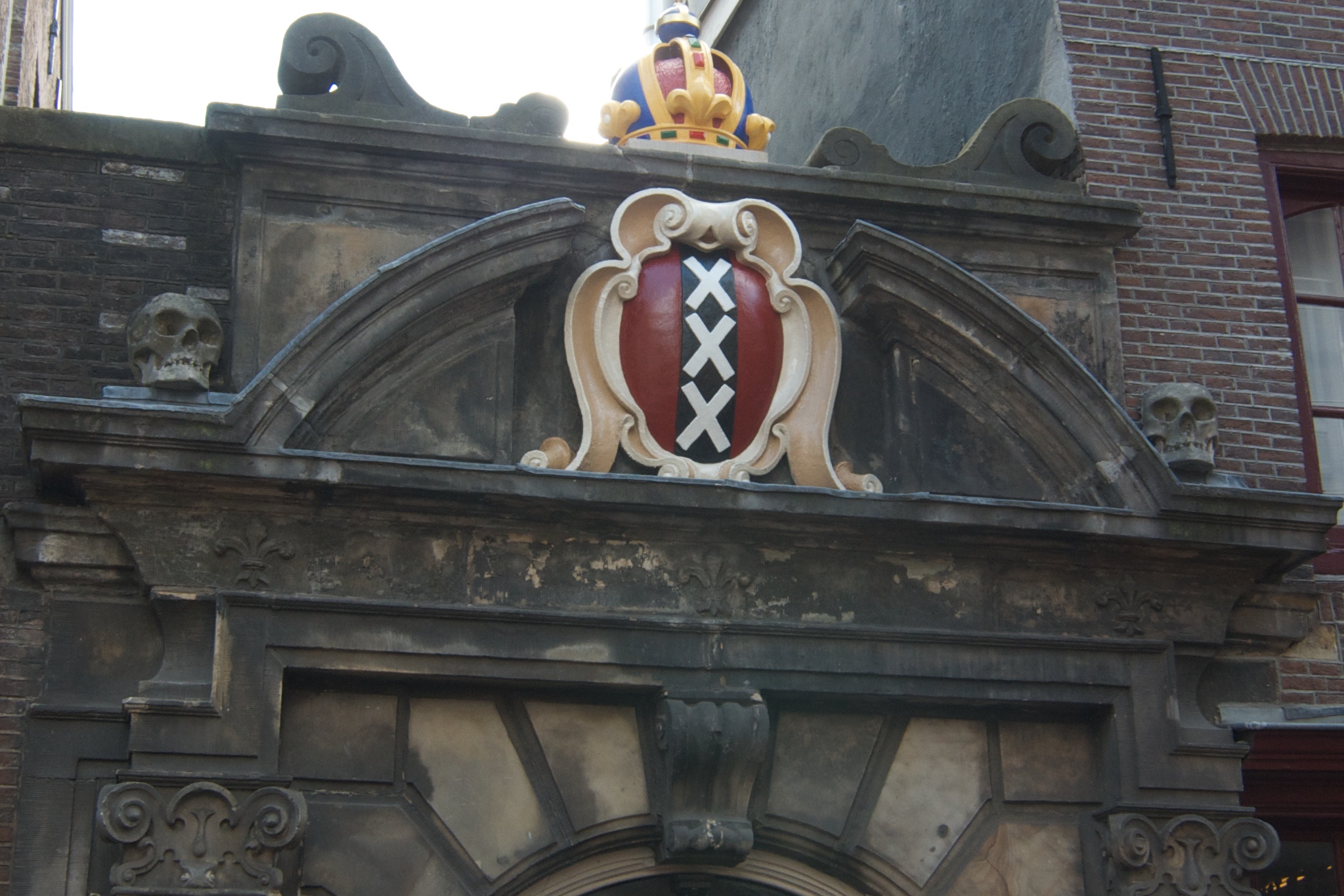 a large metal statue on the back of a building