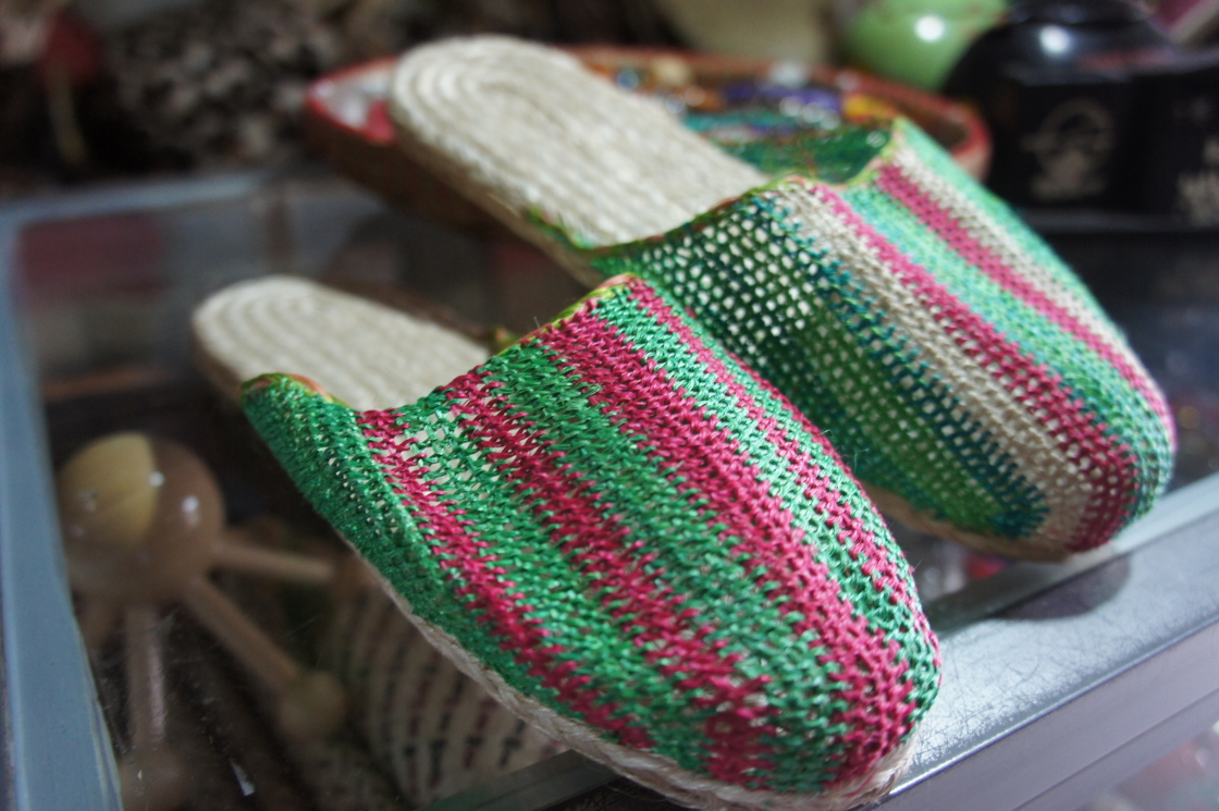 a close up of two slippers made from a pattern