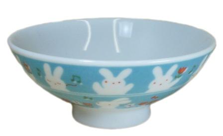 a bowl that has some bunny rabbits on it