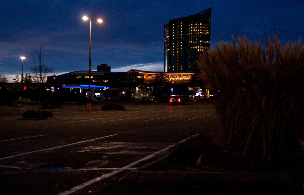 the cityscape has lights along both sides of it at night