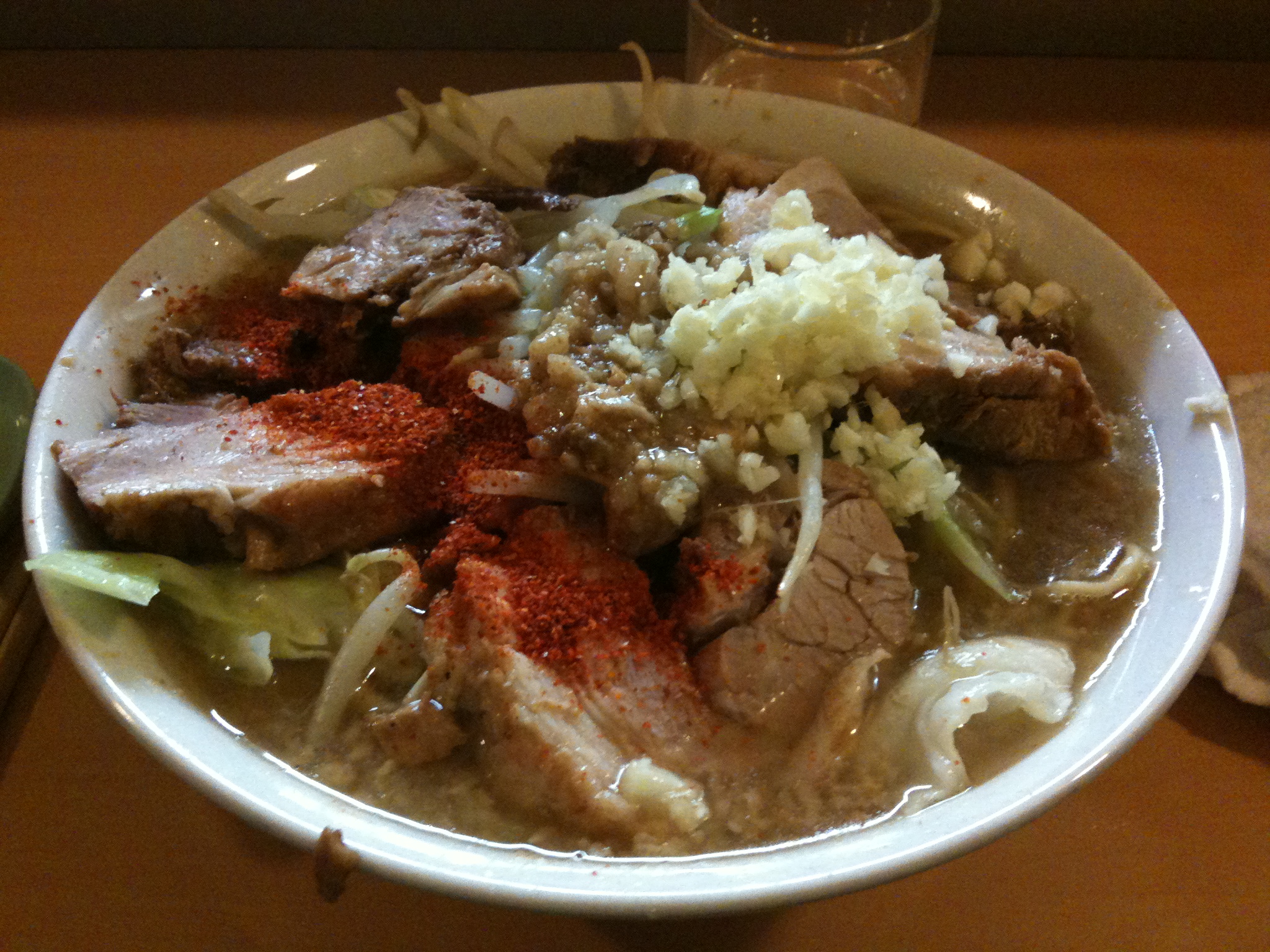 a bowl filled with different types of meat and vegetables