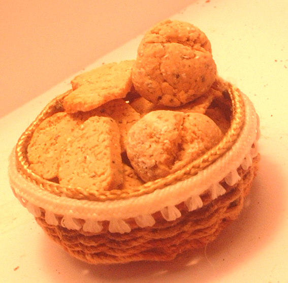 the two small baskets are filled with cookies