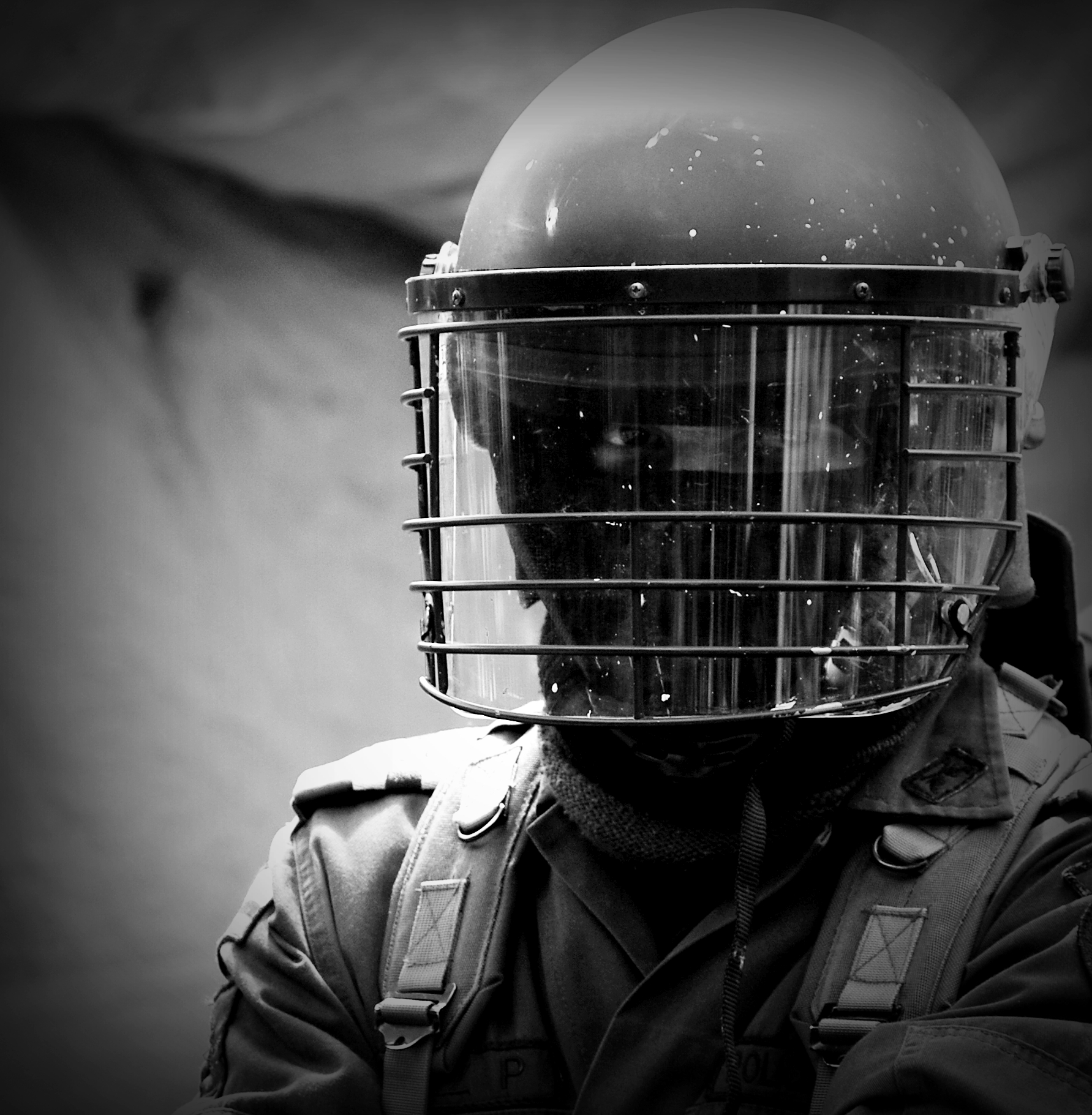 a black and white po of a soldier with a protective mask