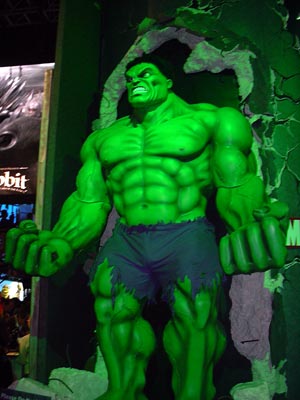 a hulk statue in the middle of a display