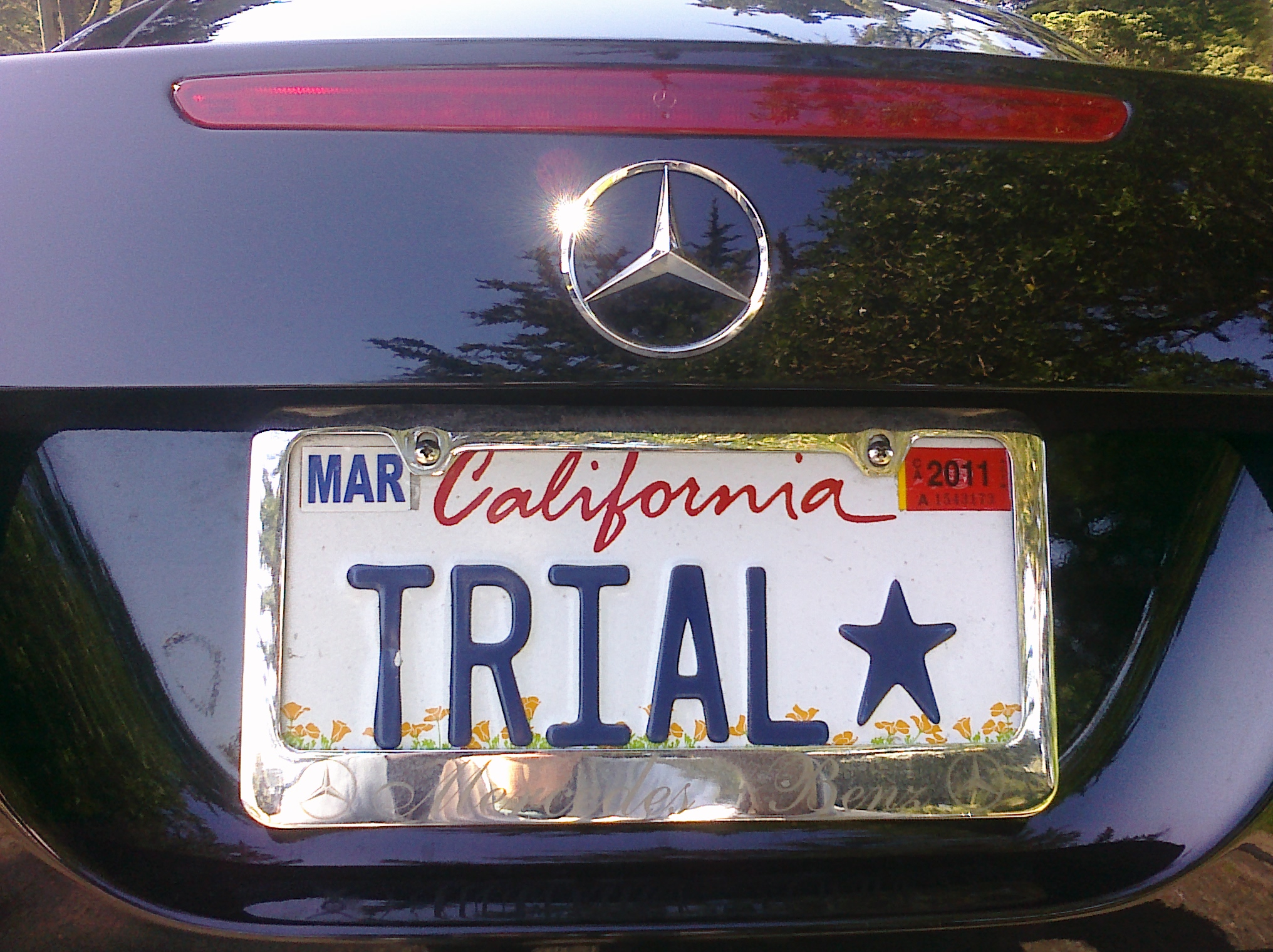 the license plate on a car that states in red, white and blue