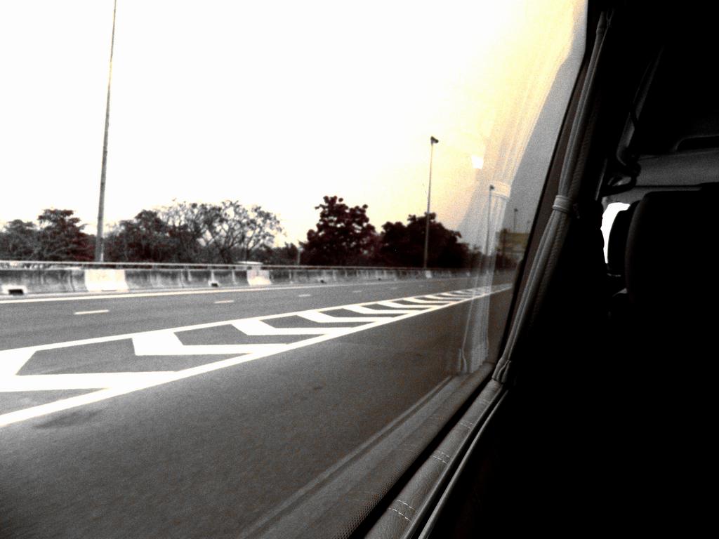 the inside view of a vehicle as it drives