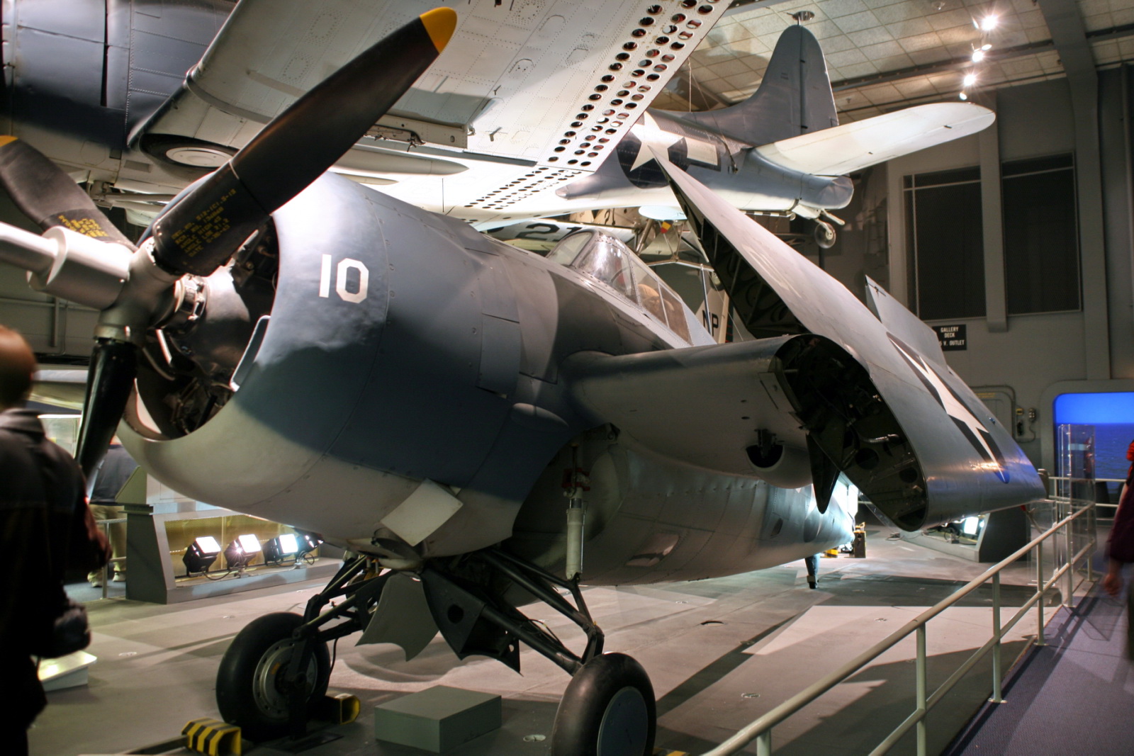 a jet plane is displayed in the museum