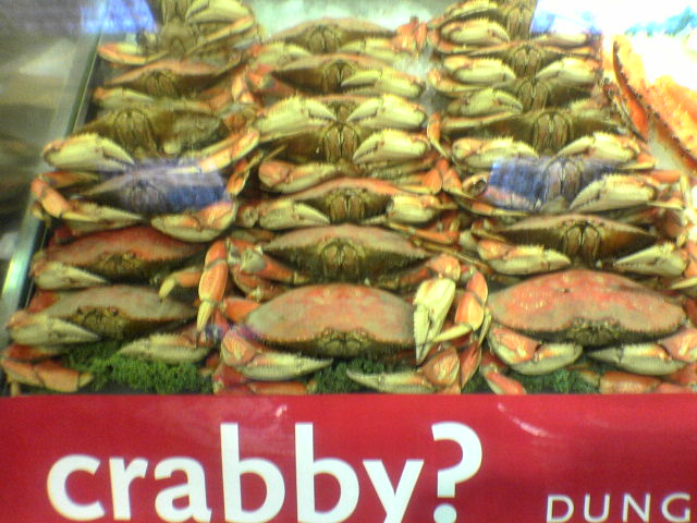 crabs are for sale in a store's display