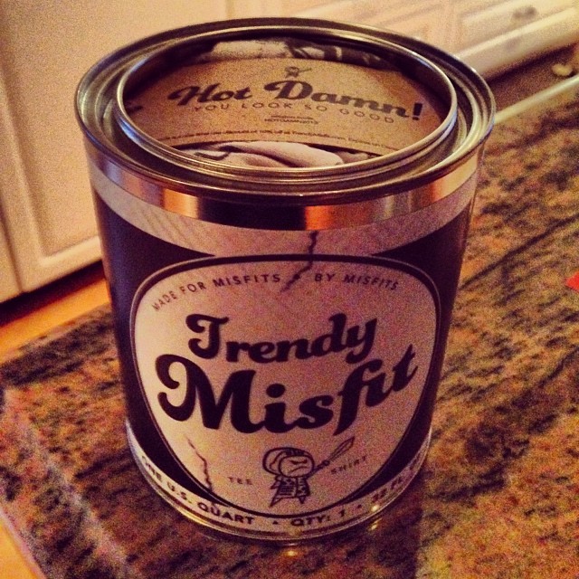 a canned beverage sitting on the counter of a kitchen