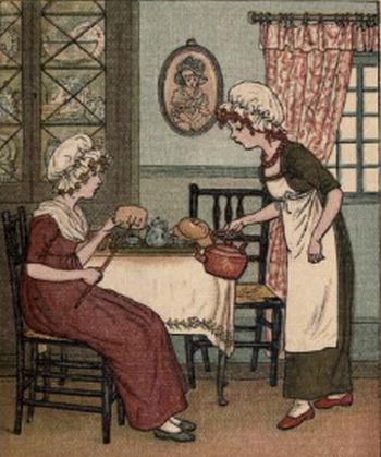 two ladies making cookies together in a kitchen