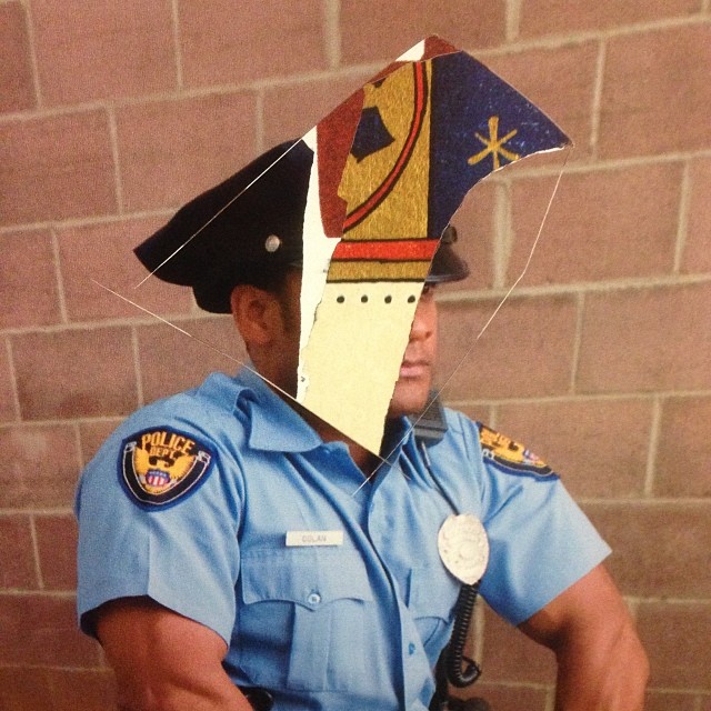 a policeman in uniform with a kite hat