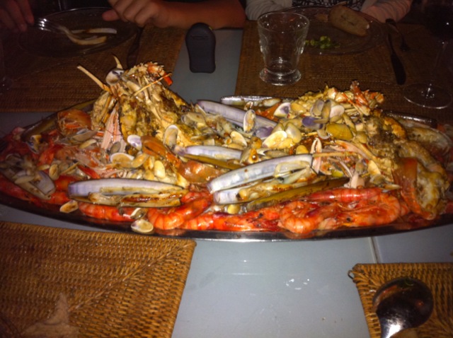 an elaborate plate of seafood sits on a table