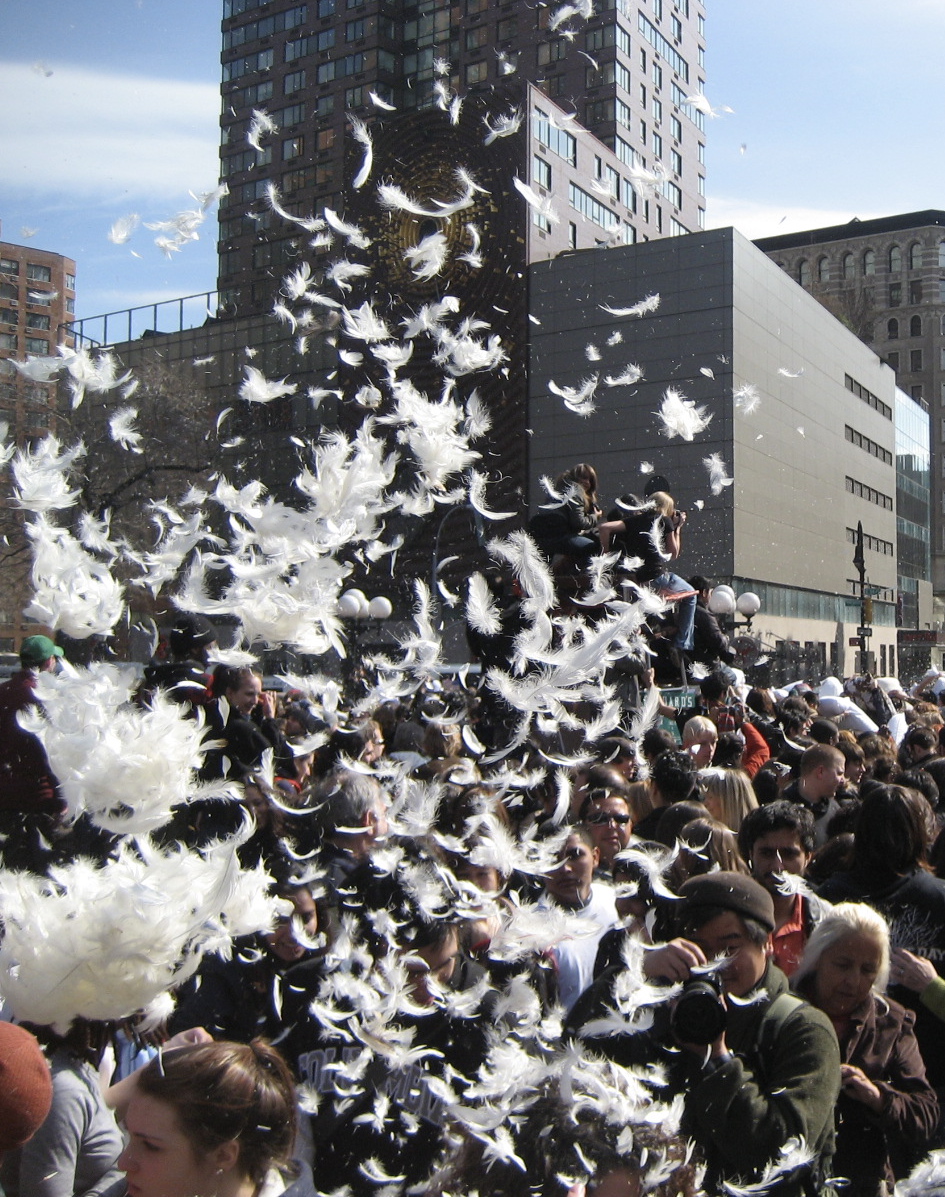 a crowd of people on the street watching soing white