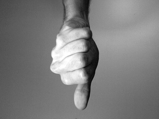 a close up of a hand with two fingers
