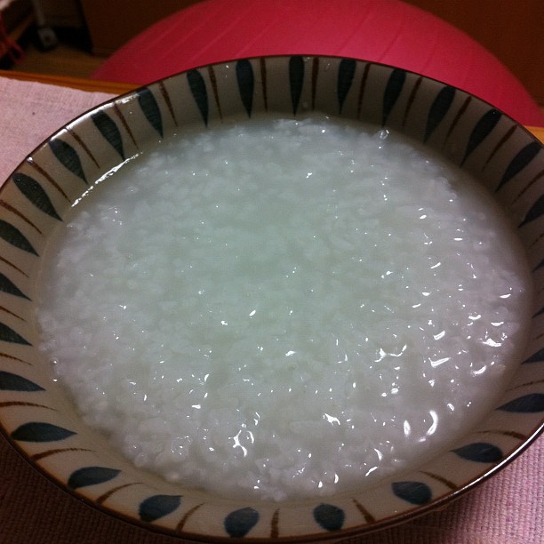bowl of rice on table with cloth in place