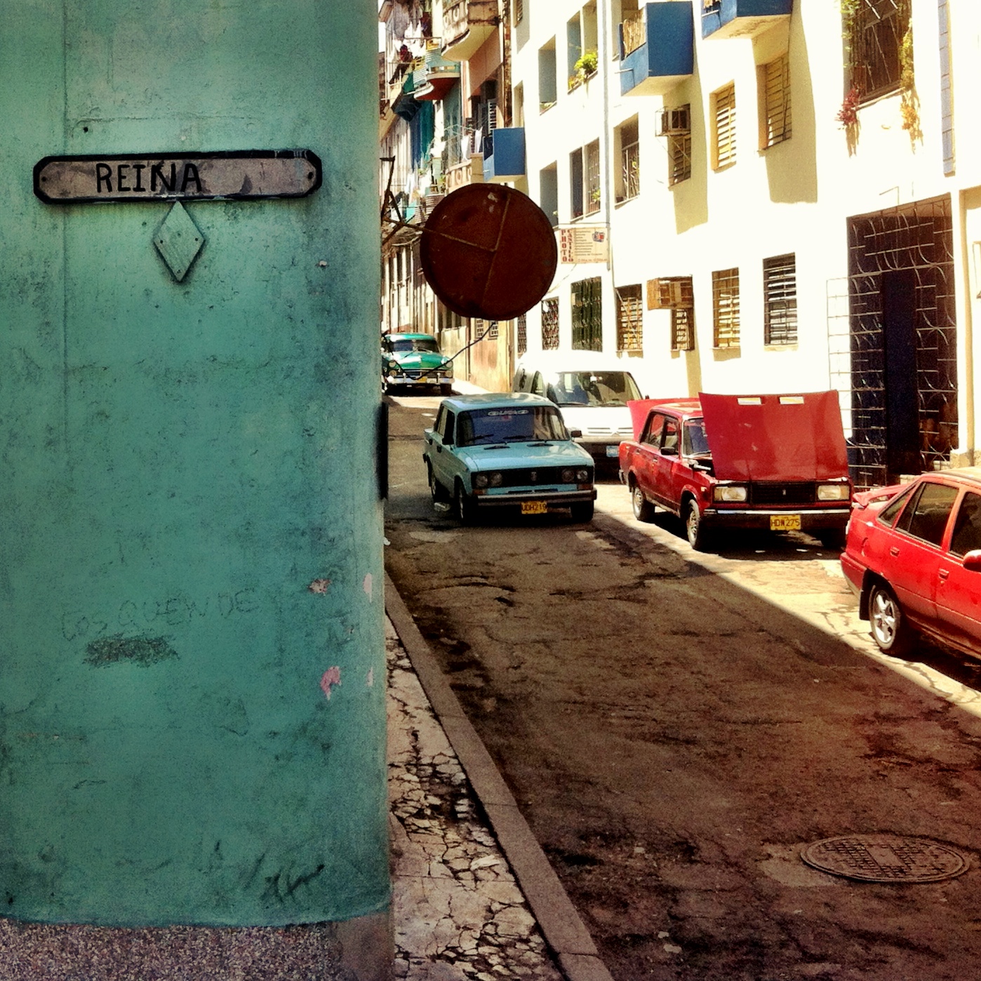 a view down an old narrow street in a city