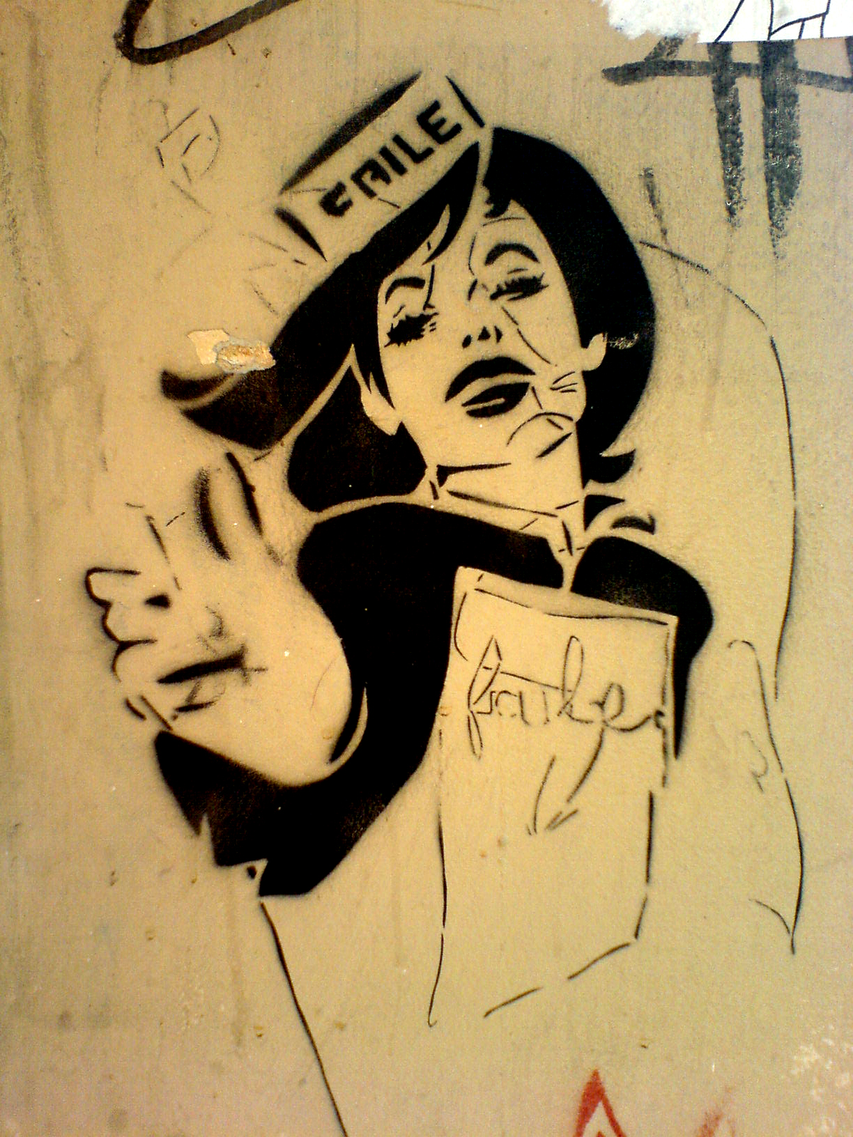 a graffiti drawing of an angry woman pointing with her right hand