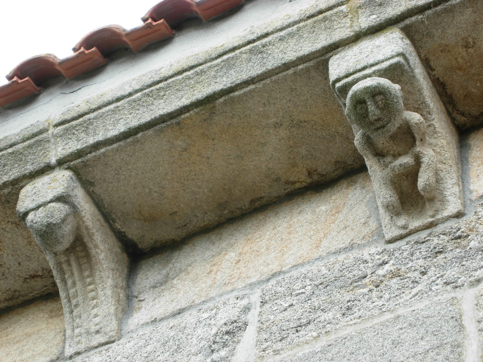 stone sculpture on the outside of a building