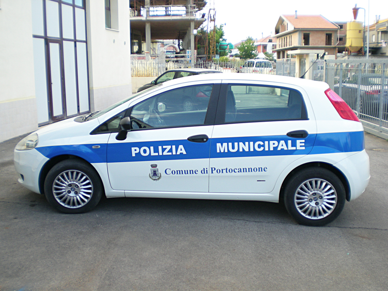 a police car is parked in the street