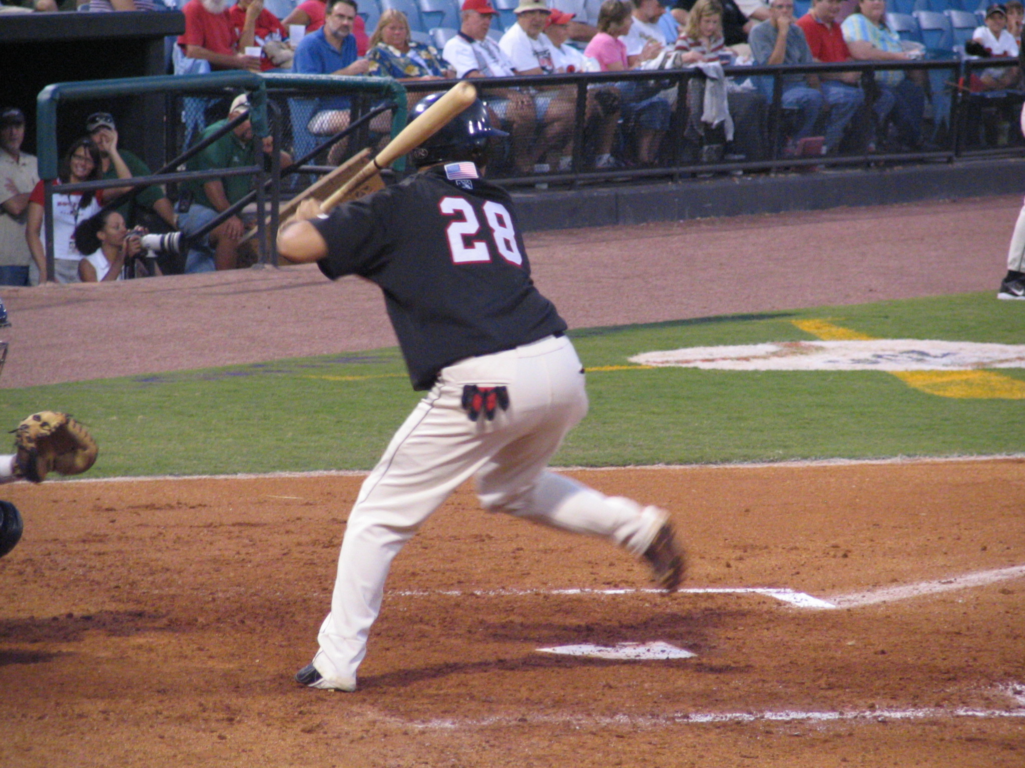 a batter ready to swing the bat at home plate