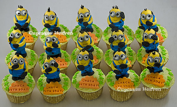 a group of minions cake cups sitting next to each other