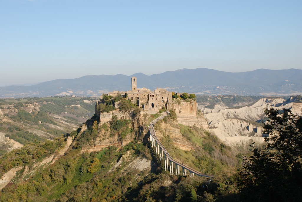 an old castle sitting on a cliff that looks like it could be built