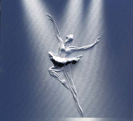 artistic sculpture depicting ballerina in black dress standing on silver background