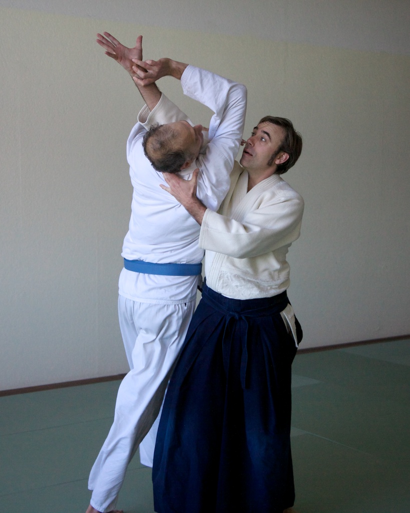 two men are trying to work on martial moves