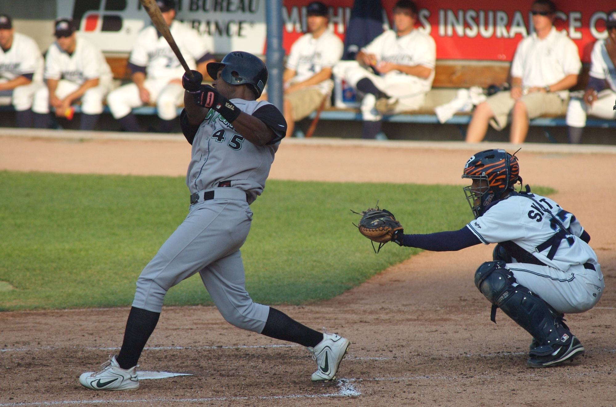 the baseball player is up to bat, getting ready to run