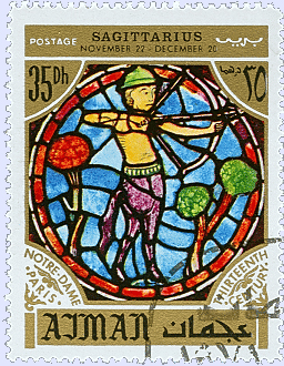 an egyptian stamp features a stained glass man