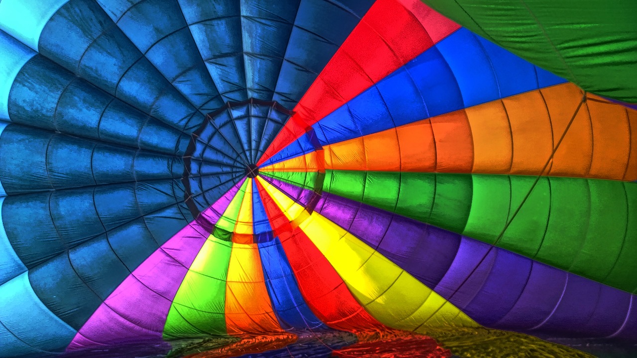 a large  air balloon is being prepared for flight