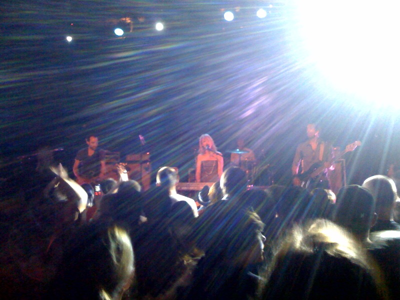 a group of people that are sitting in the crowd