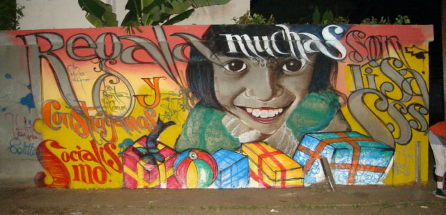 an image of the face of michael smith painted on a wall