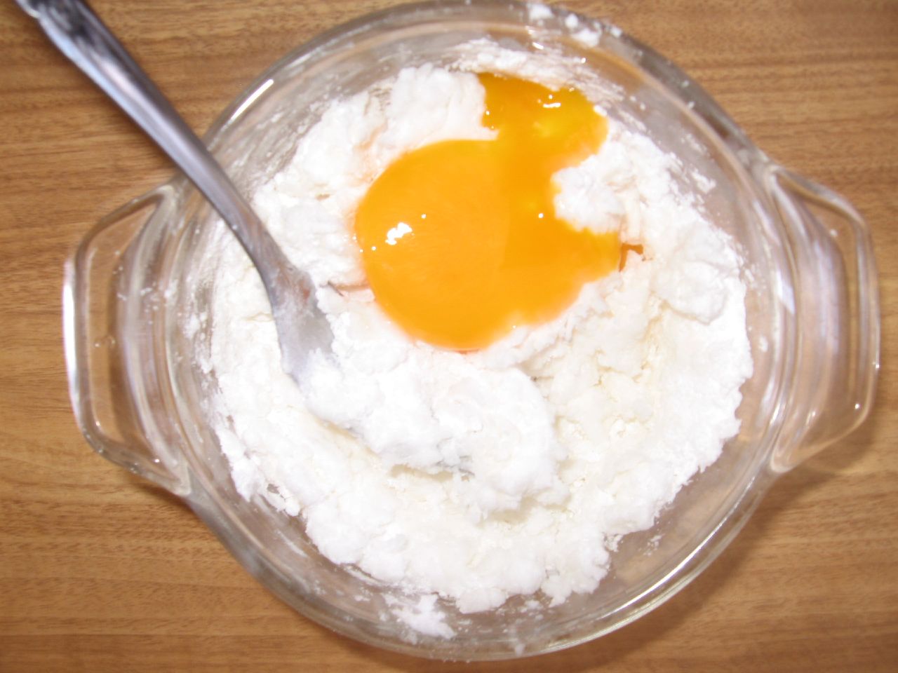 a food processor with rice and an egg in it