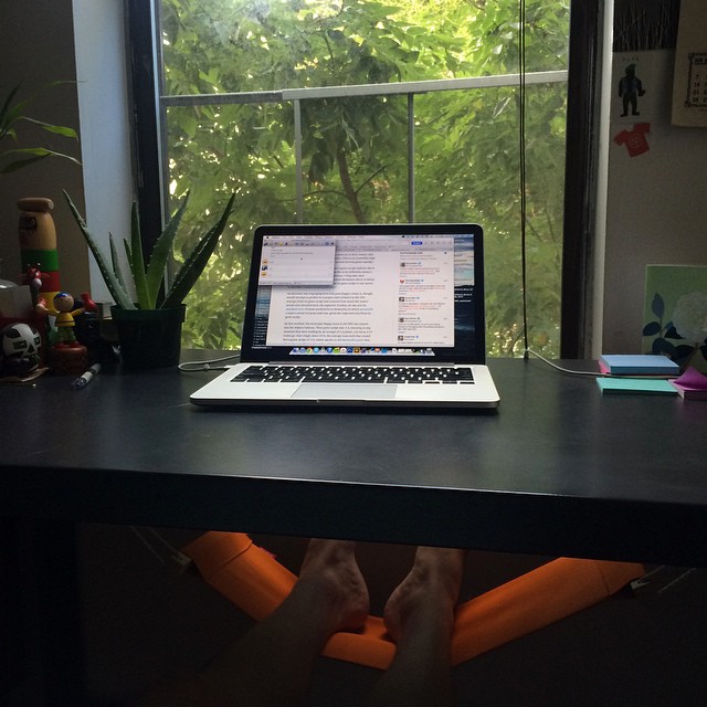 an open laptop sitting on top of a desk