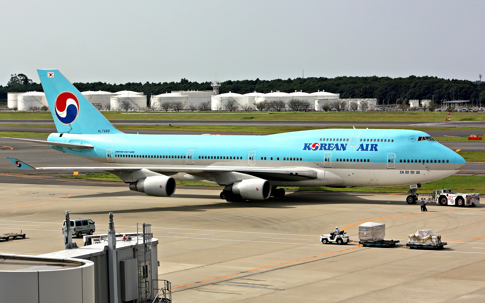 a korean air jumbo jet is on the runway