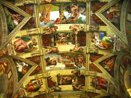 paintings and pictures on the ceiling of a building