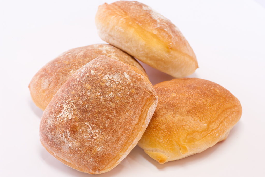 a group of three donuts sitting on top of a table