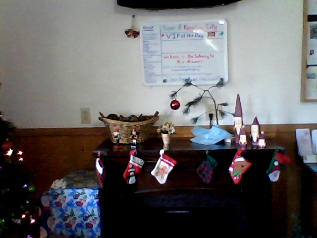 a christmas stockings hanging from a wooden table