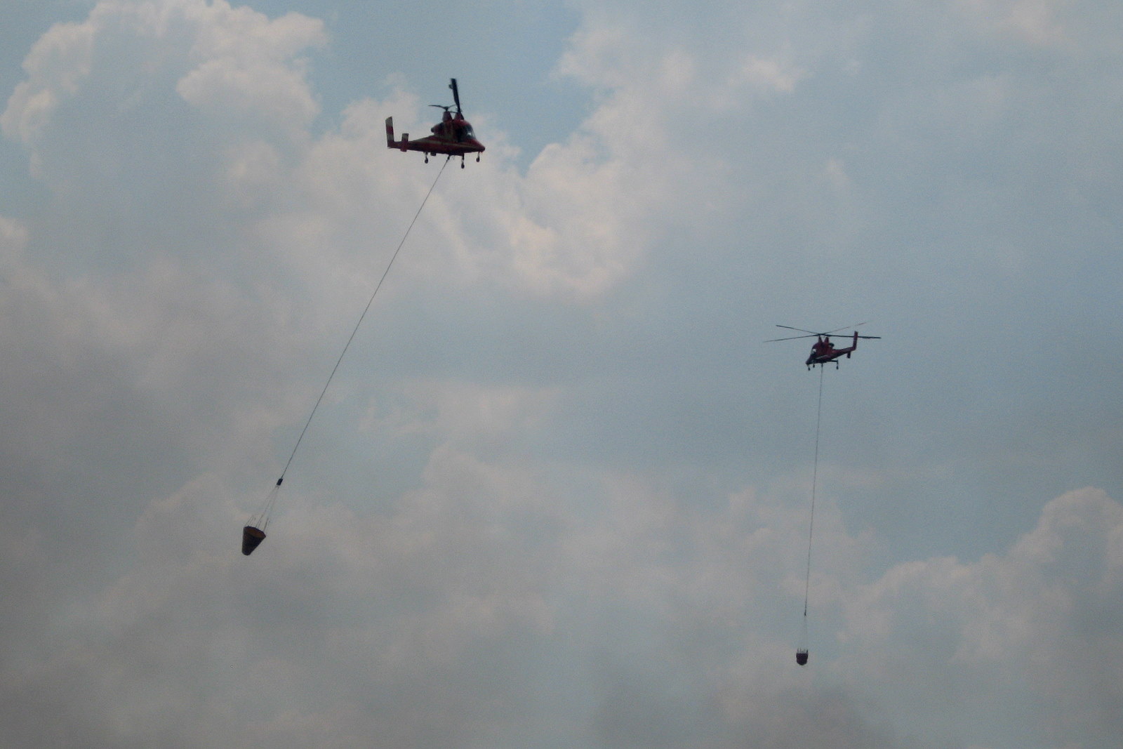 two military helicopters being used to rescue them